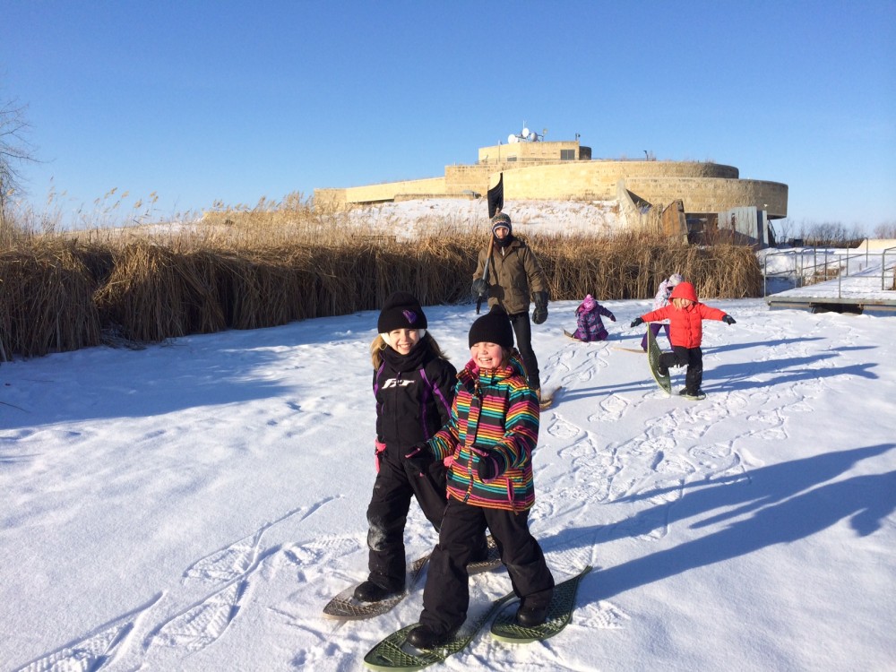 Kids snowshoeing at the marsh